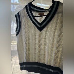 White, black trimmed knitted vest